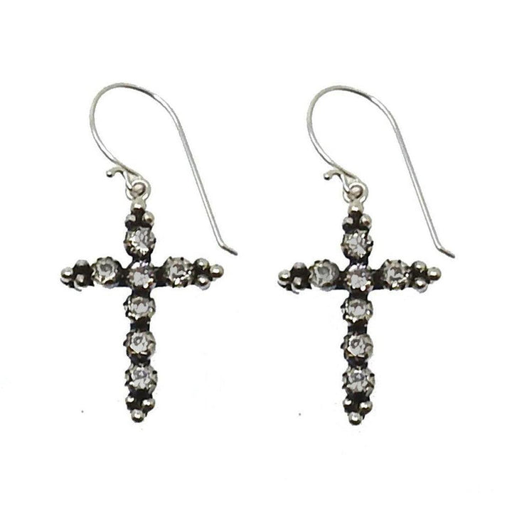 Silver cross earrings adorned with sparkling stones.