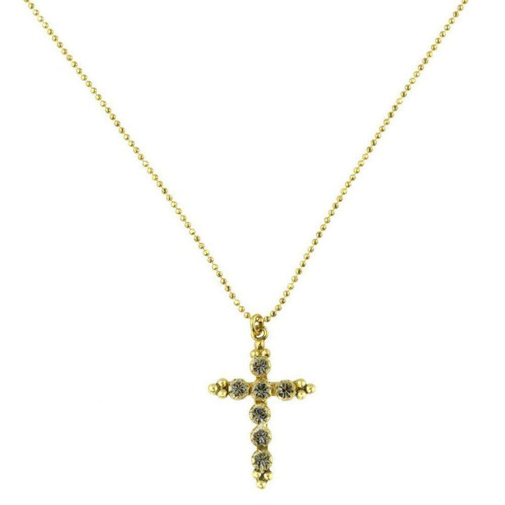 Gold chain necklace with a small, jeweled cross pendant.