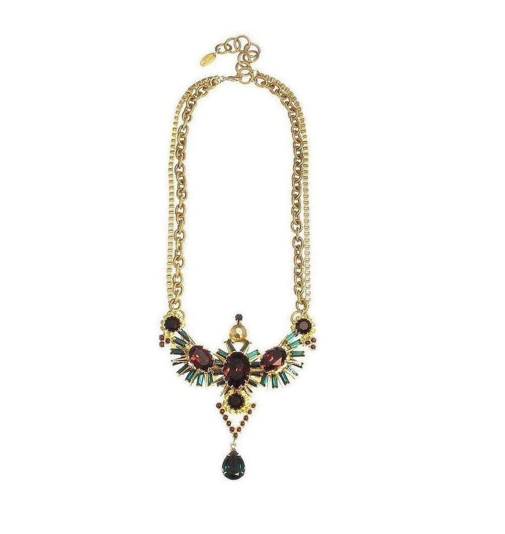 Gold statement necklace with burgundy and green gemstone accents.
