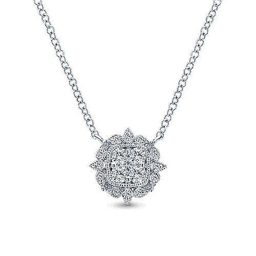 Milgrain diamond pendant necklace with a square-cut cluster of diamonds in a floral setting.