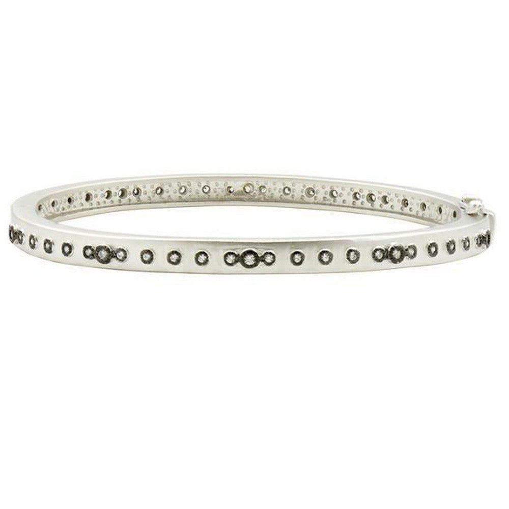 Mini Stud Bezel Stone Hinged Bangle: Silver hinged bangle with pave diamonds and bezel-set stones.