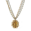 Gold Miraculous Medal necklace with cream and clear beaded chain