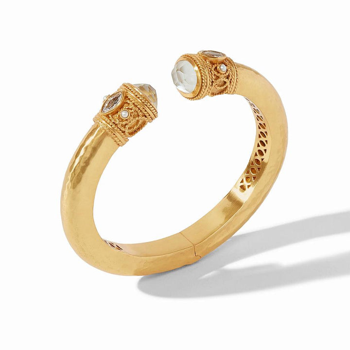 Gold cuff bracelet with quartz and gemstone accents, hammered texture.