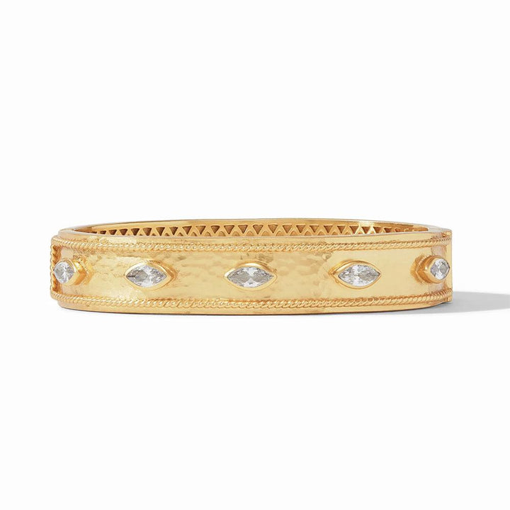 Gold hinged bangle bracelet with clear marquise-cut stones.