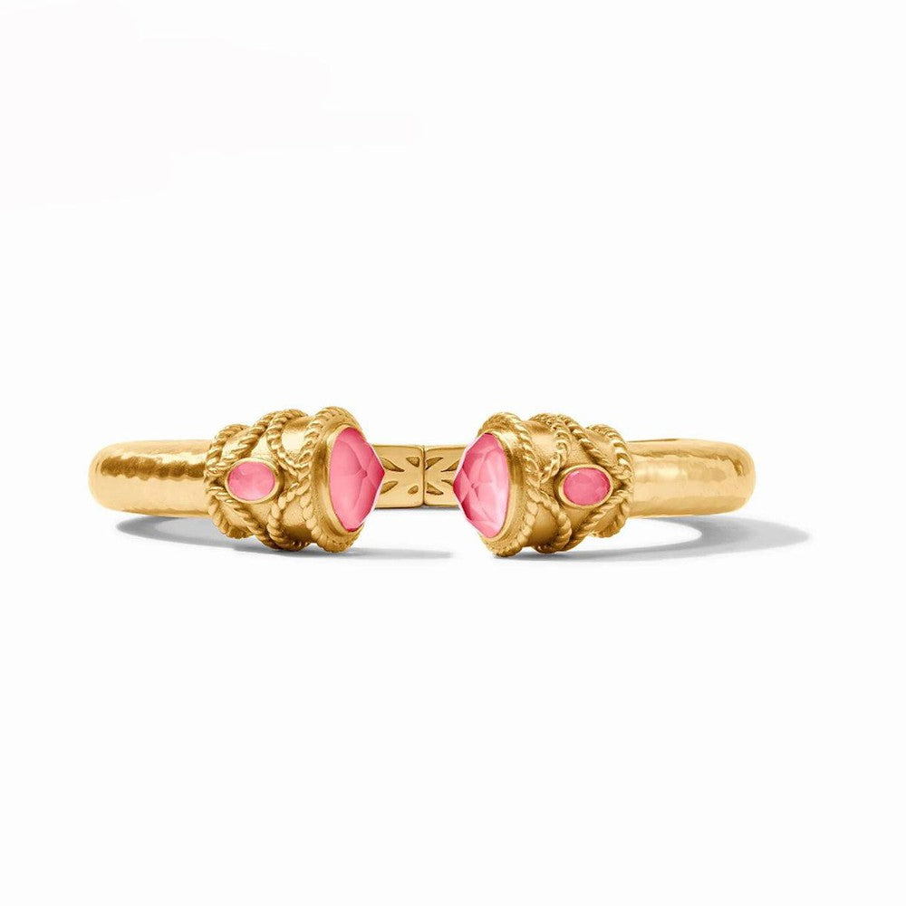 Gold hammered cuff bracelet with pink gemstones.