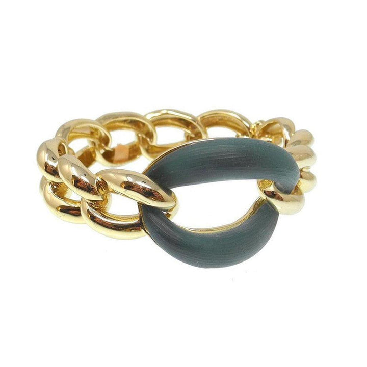 Gold chain bracelet with dark green enamel accent.