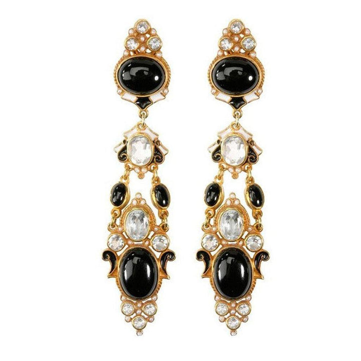 Elegant Onyx and White Topaz drop earrings with gold accents.