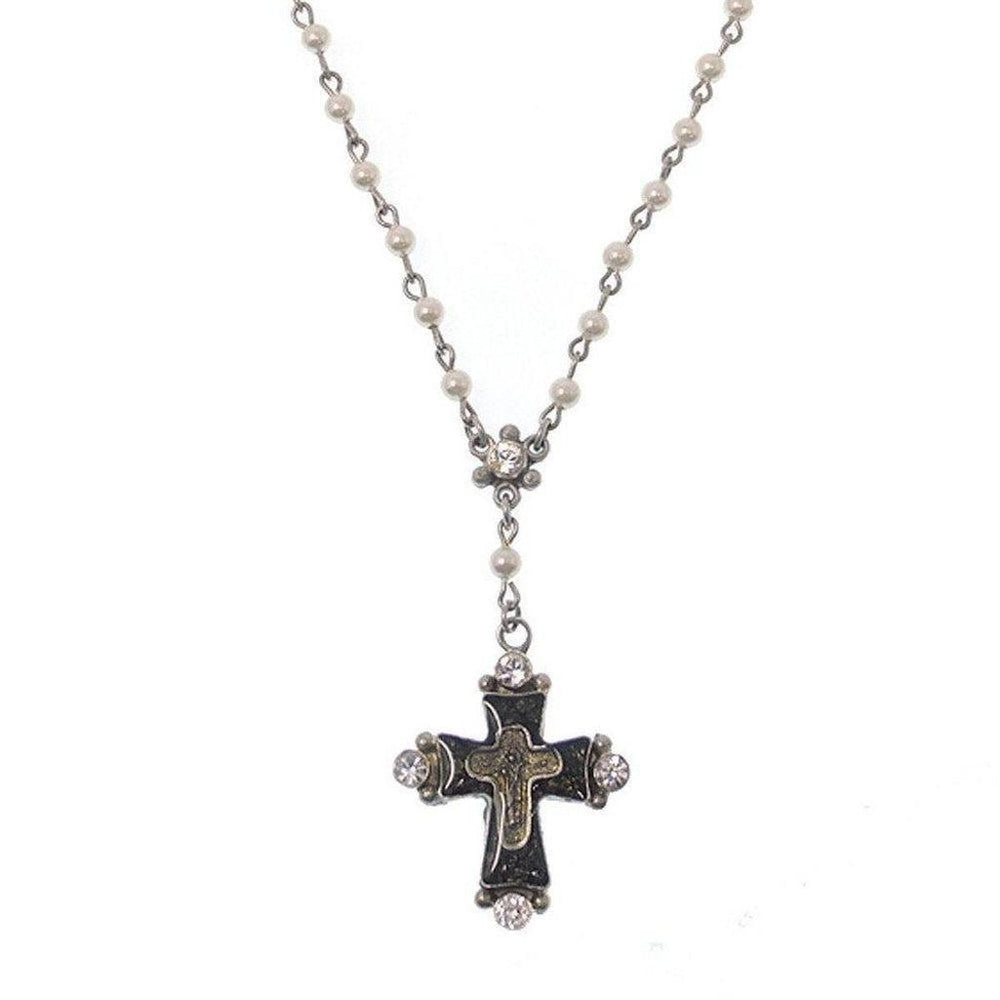 Elegant pearl rosary necklace with a dark cross pendant adorned with sparkling crystals.