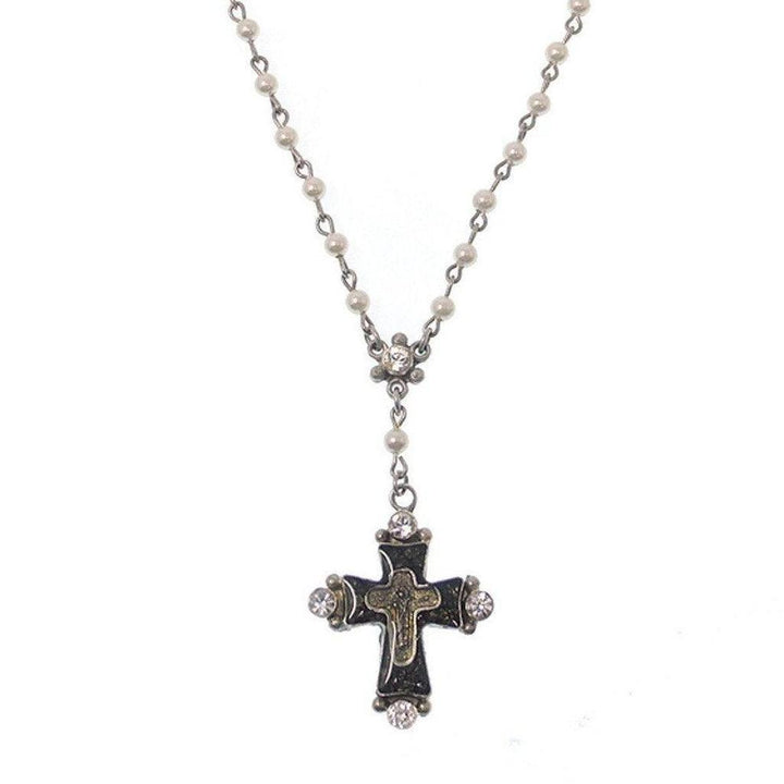 Elegant pearl rosary necklace with a dark cross pendant adorned with sparkling crystals.