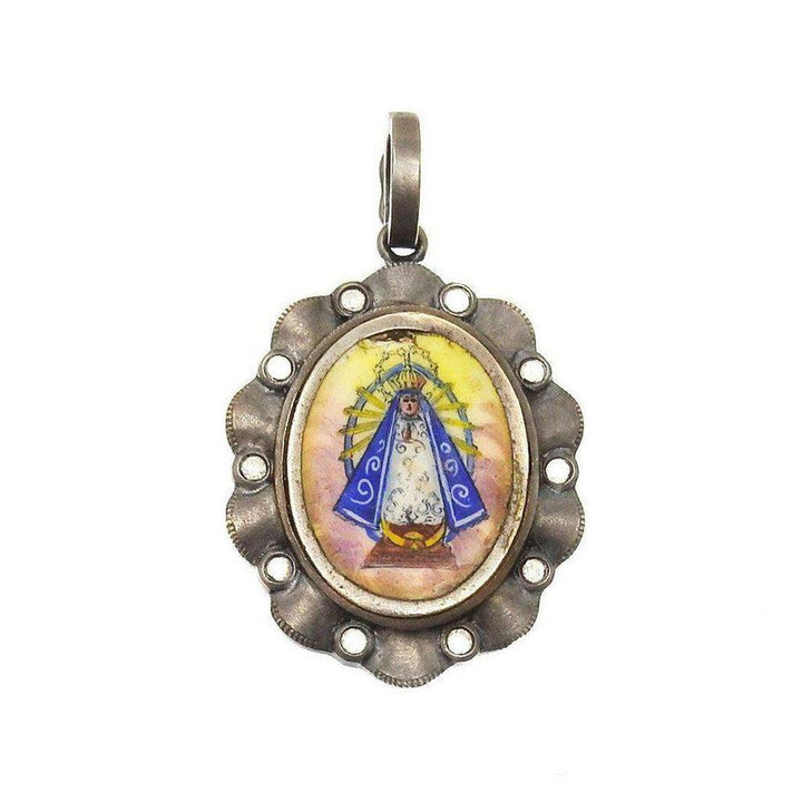 Oval Our Lady of Lujan medal pendant with diamond accents, featuring hand-painted enamel detail.