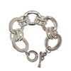 Silver oval chain link bracelet with a toggle clasp.