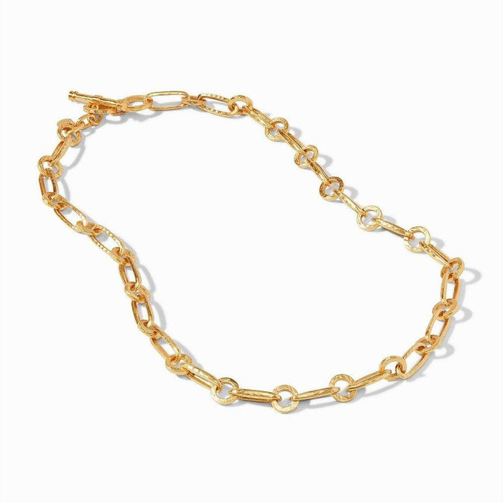 Gold chain necklace with textured links and toggle clasp.