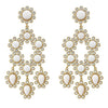 Gold Paris chandelier earrings with white stones.