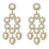 Gold Paris chandelier earrings with white stones.