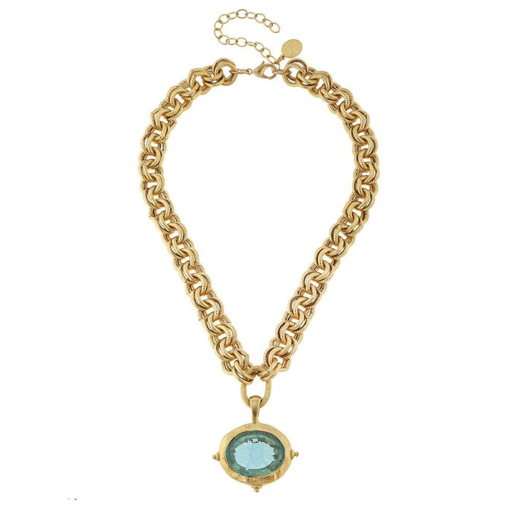 Gold chain necklace with light blue Venetian glass bee pendant.