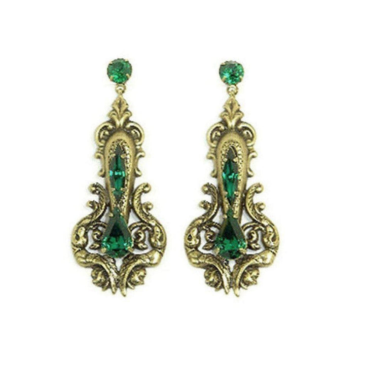 Auden Remy earrings: antique gold filigree, emerald green crystal accents.