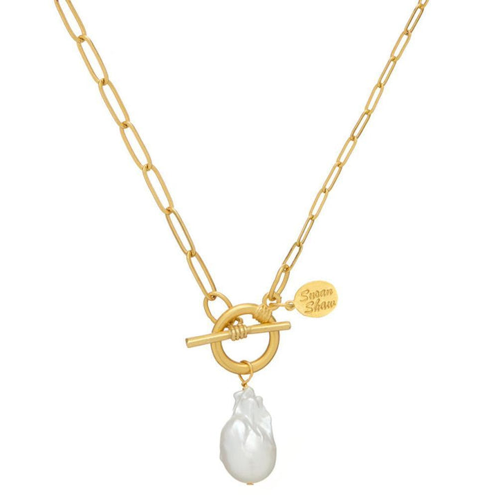 Swan Shaw Baroque Pearl Pendant Necklace: Gold chain, toggle clasp, unique baroque pearl.