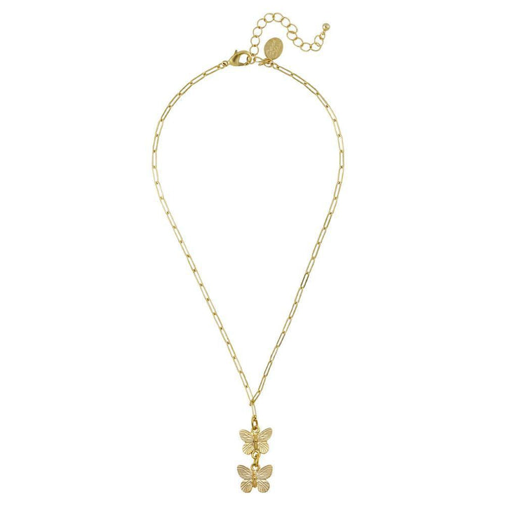 Gold necklace featuring a delicate paperclip chain and double butterfly pendant.