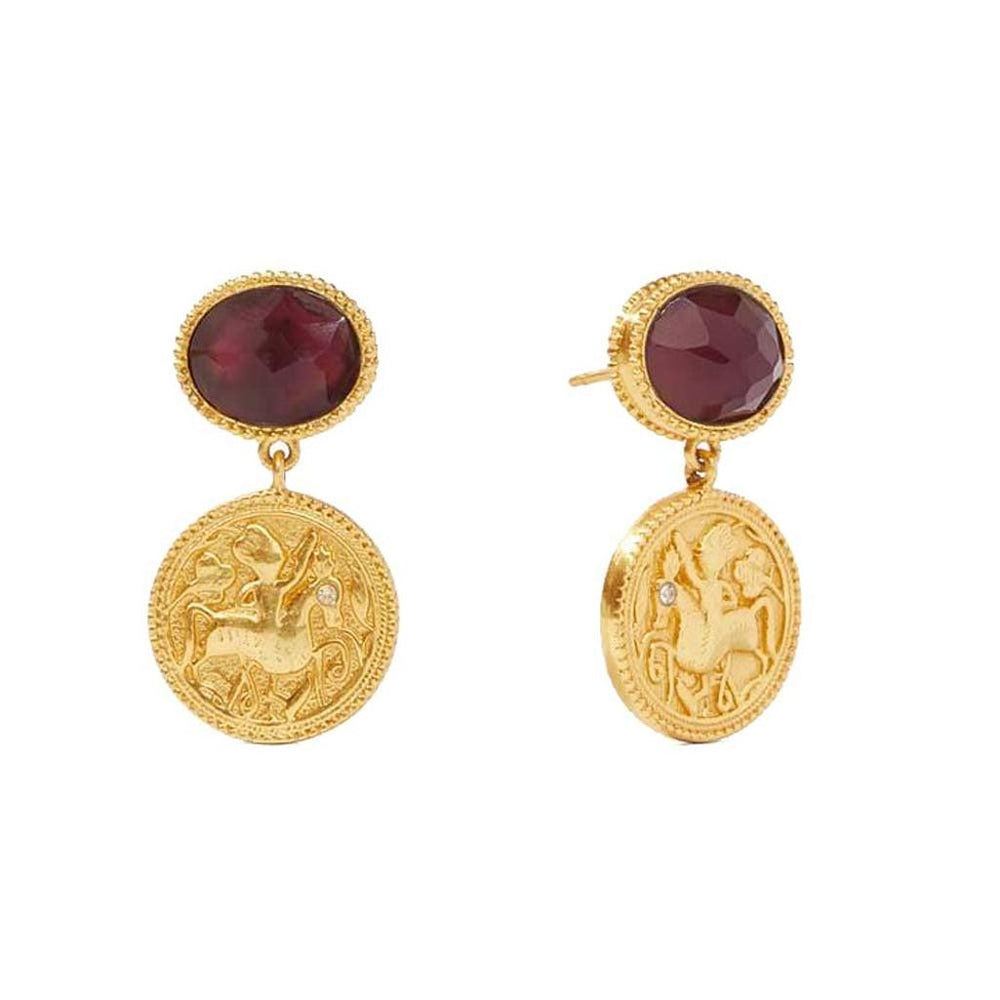 Gold coin earrings with deep red gemstone accents.