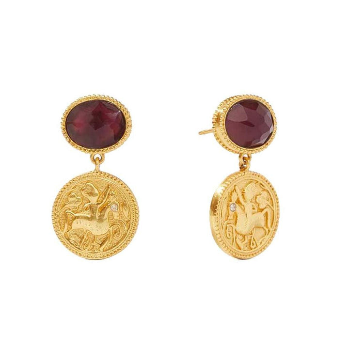 Gold coin earrings with deep red gemstone accents.