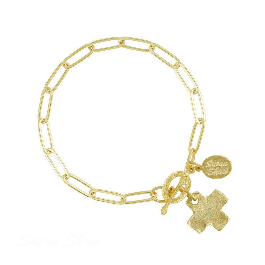 Gold Cross Paperclip Chain Bracelet with toggle clasp.