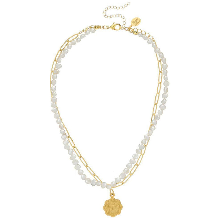 Double-strand necklace featuring gold chain and pearl accents, detailed with a gold coin pendant.