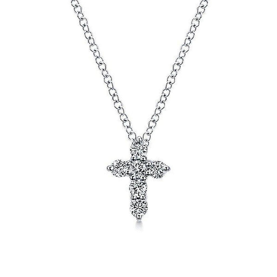 Diamond Cross Necklace: Elegant silver chain, delicate cross pendant adorned with sparkling diamonds.