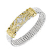 Diamond cuff bracelet with gold and silver design, featuring sparkling diamonds.