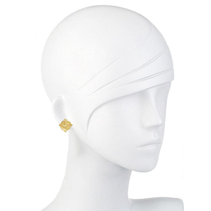 Gold stud earrings with textured rose design, shown on a mannequin.