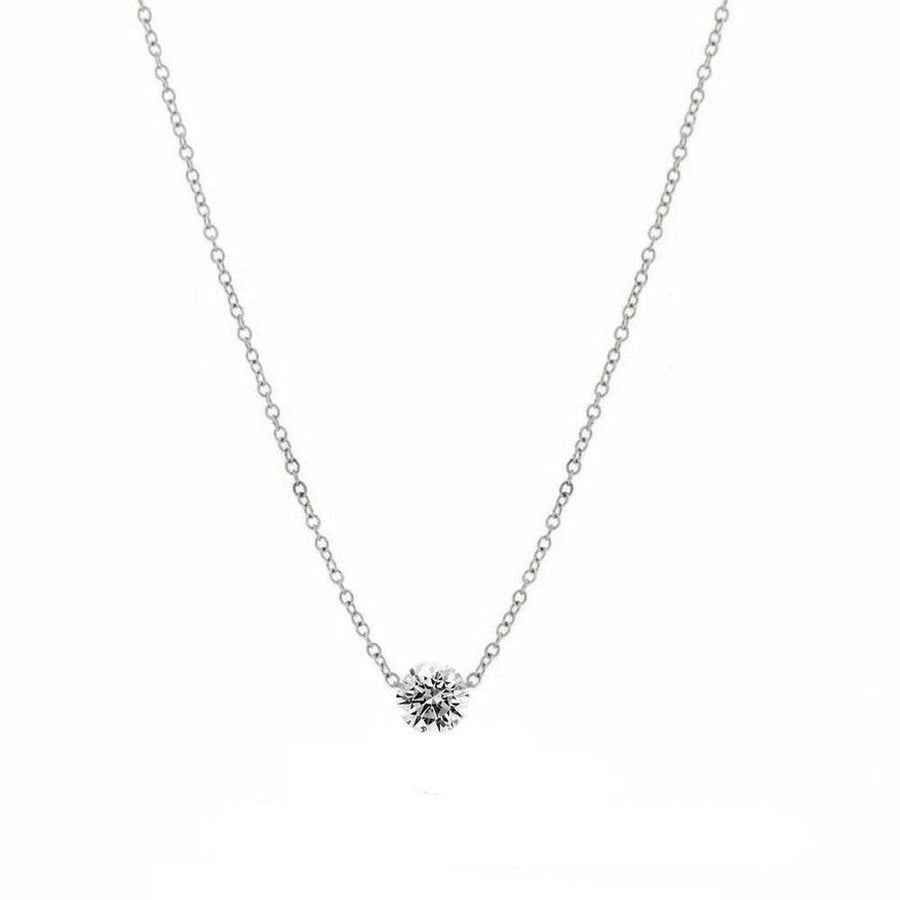 Elegant solitaire diamond pendant necklace with delicate chain.