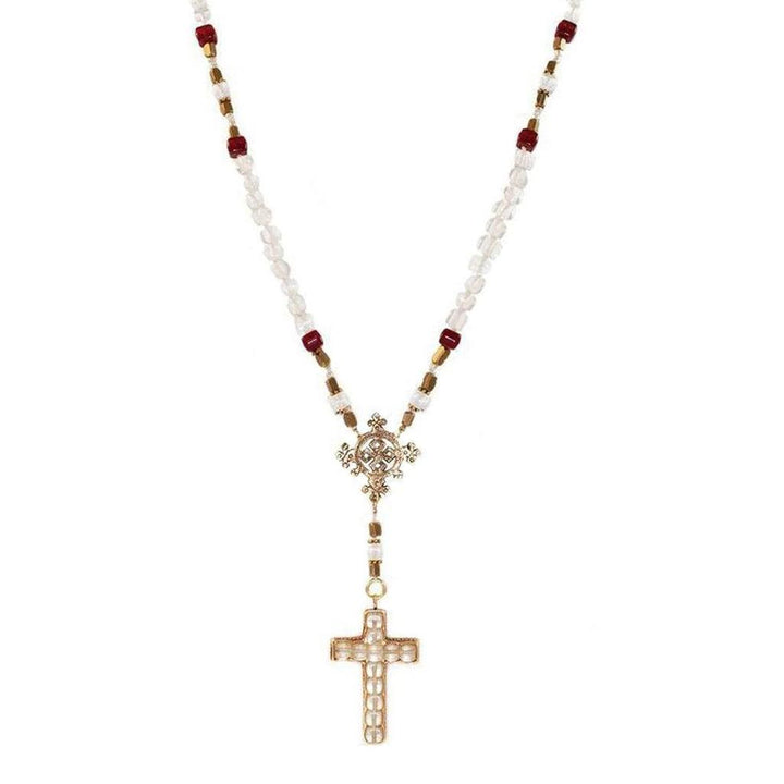 Gold cross necklace with white and burgundy beads.