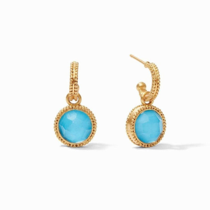 Gold hoop earrings with turquoise stone accents.