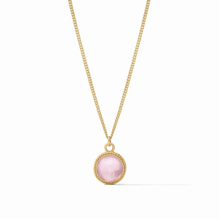 Gold chain necklace with a delicate pink gemstone pendant.
