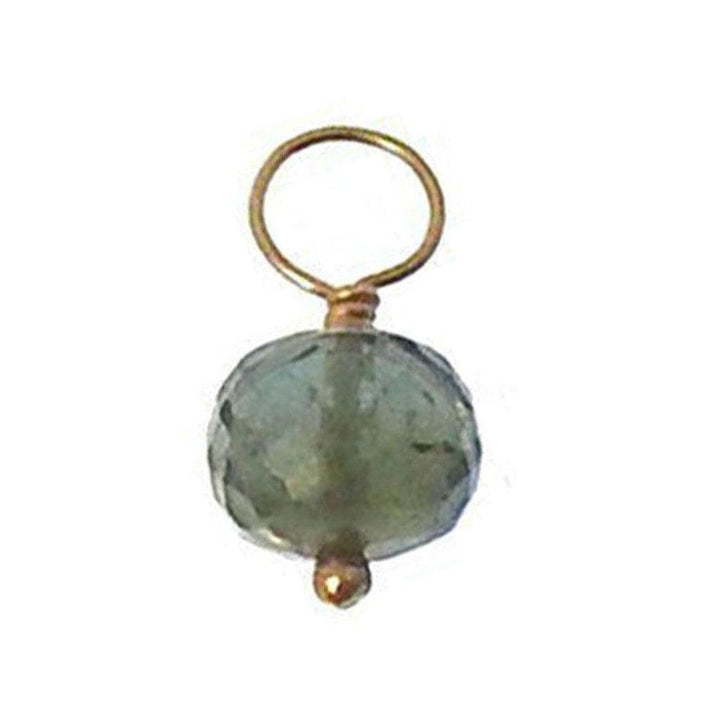 Green gemstone charm with gold wire loop and bead.