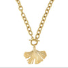 Gold Ginkgo Leaf Toggle Necklace: Statement gold chain with textured detail and unique ginkgo leaf pendant.