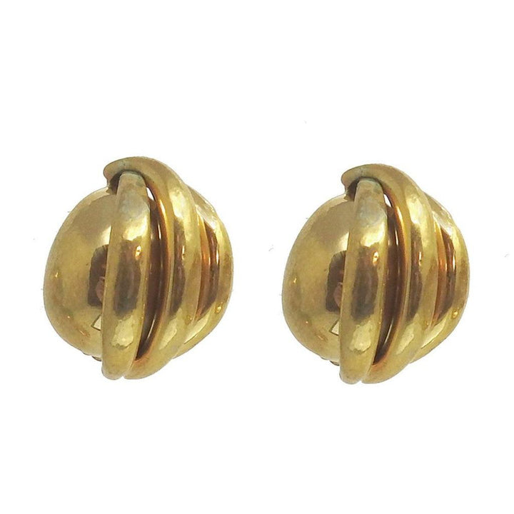 Gold button clip earrings with wrapped design