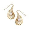 Gold oyster shell dangle earrings with pearl accents