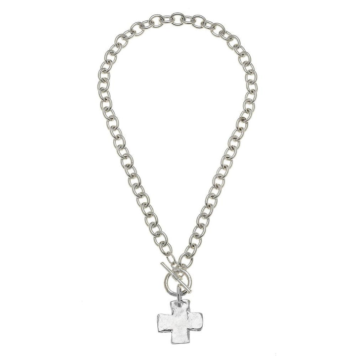 Silver cross pendant necklace with chunky chain and toggle clasp.