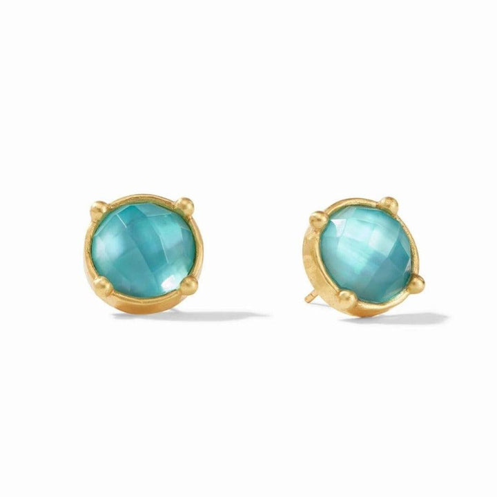 Gold stud earrings featuring round, teal gemstones.