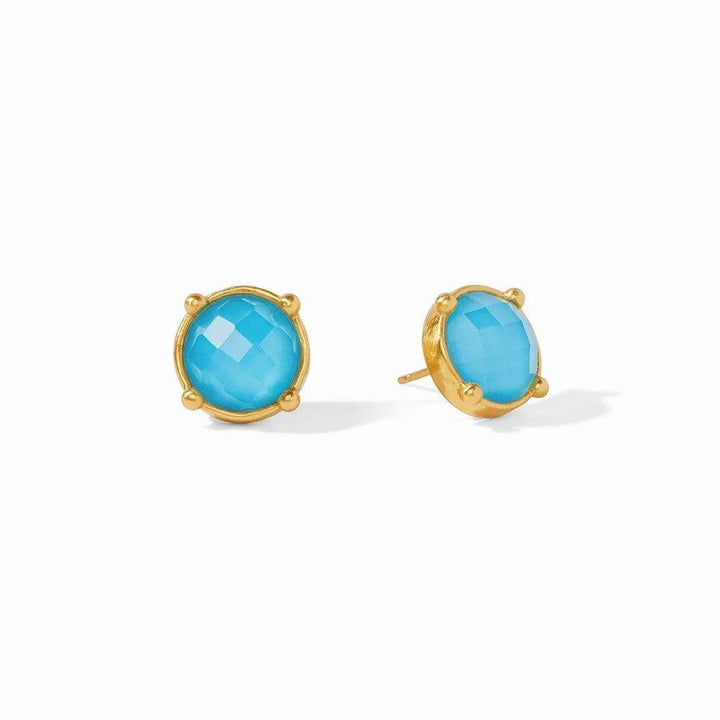 Round turquoise stud earrings with gold settings.