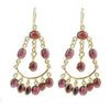 Joy Garnet Earrings: Gold chandelier earrings featuring rich red garnet stones.