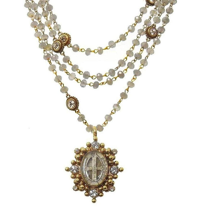 Multi-strand labradorite necklace with gold accents and a detailed cross pendant.