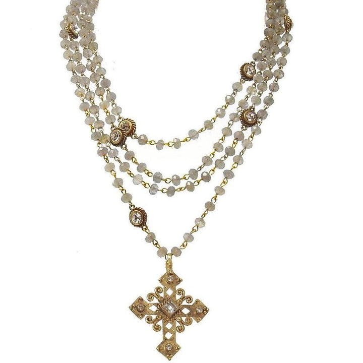 Multi-strand labradorite necklace with gold accents and a detailed cross pendant.