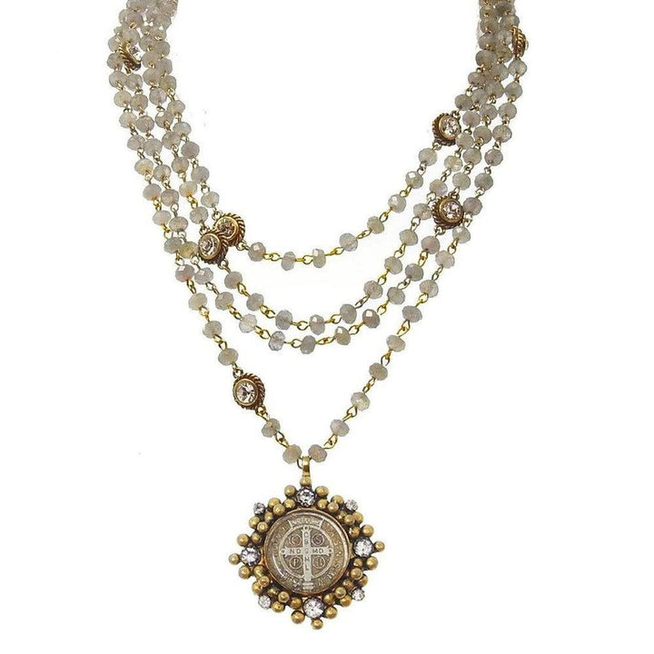 Lux Magdalena Labradorite necklace: layered grey gemstone beads, gold accents, & antique-style pendant.
