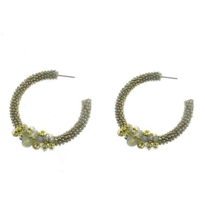 Beaded silver hoop earrings with gold and clear accents.