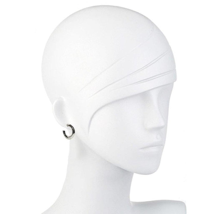 Silver hoop earring on a mannequin.