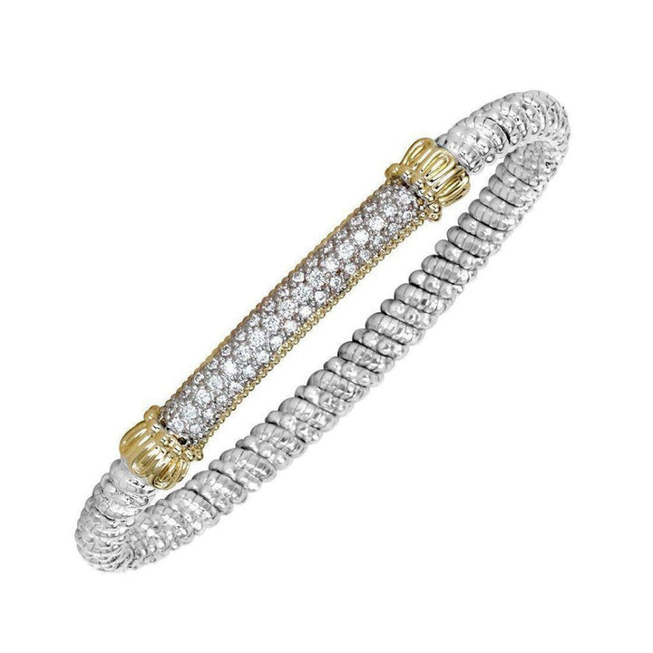 Pave bar diamond bracelet with twisted silver band and gold accents.