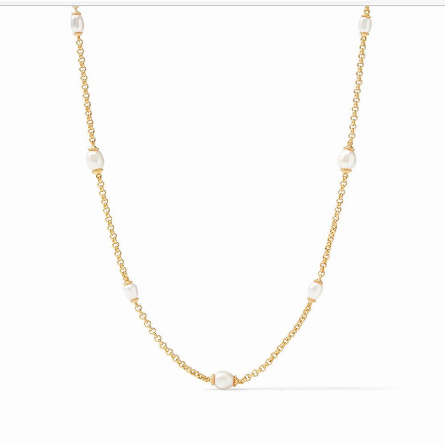 Marbella Pearl Station Necklace: Elegant gold chain with five lustrous pearls.
