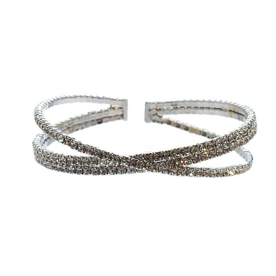 Silver crystal cuff bracelet with three rows of sparkling stones in a crisscross design.
