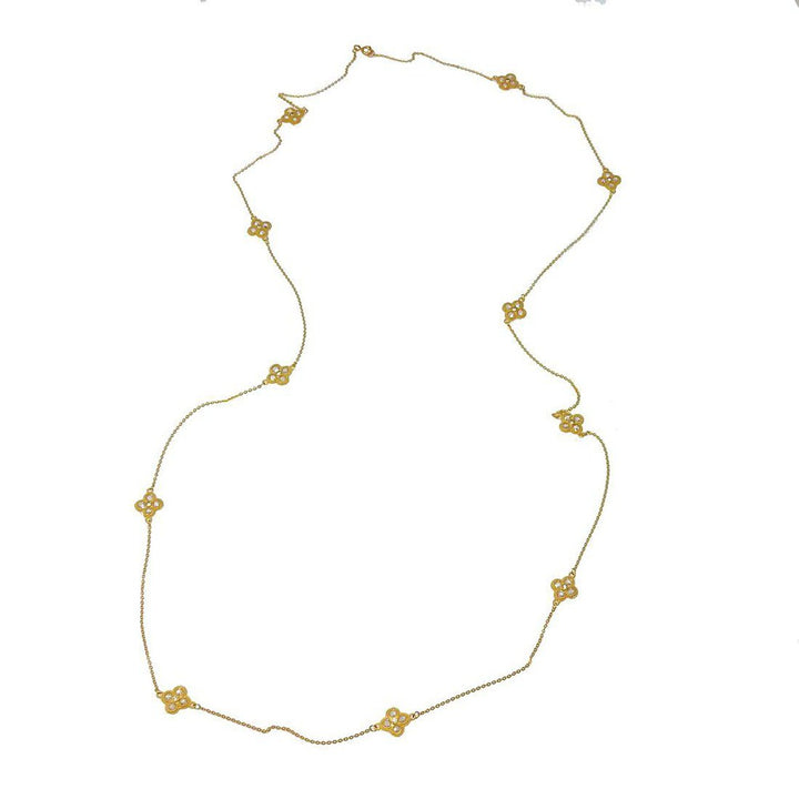 36-inch gold necklace with floral accents and small stones.
